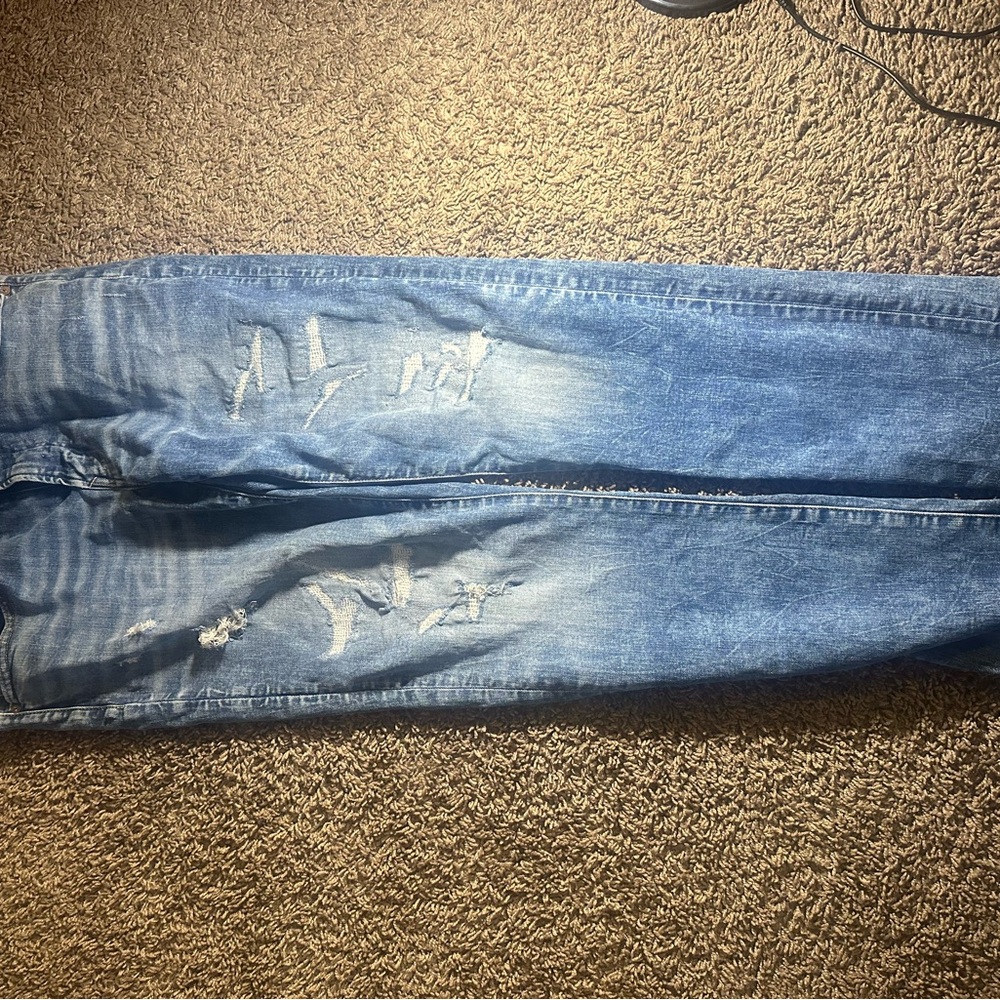 Distressed Blue Jeans